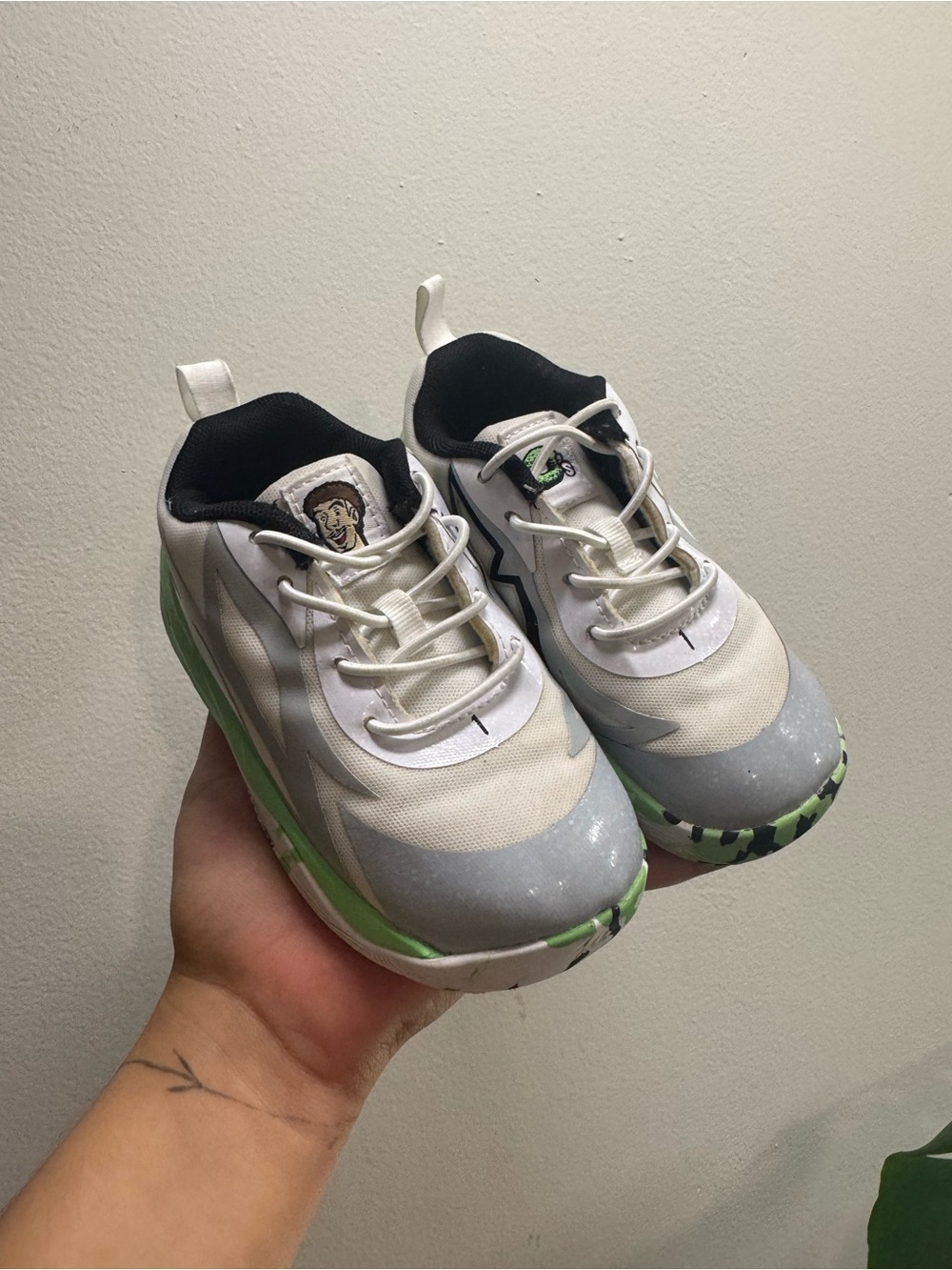 Puma Kids White and Gray Sneakers with Green Accents